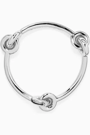 Kate Spade Interlock Bangle in -tone Brass