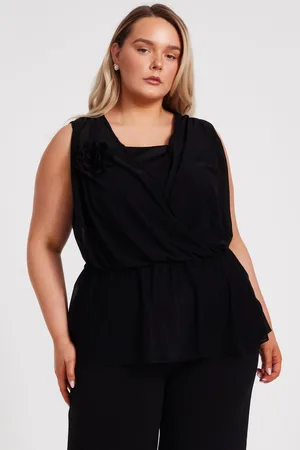Quiz Curve Peplum Top