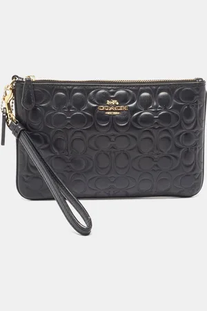 Coach Signature Embossed Leather Wristlet Pouch