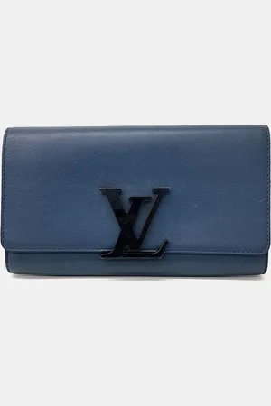 LOUIS VUITTON Leather Capucines Clutch