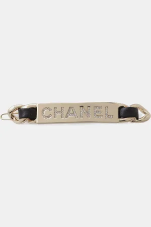 CHANEL Plated and Leather Rhinestone Logo Hair Clip