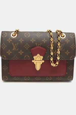 LOUIS VUITTON Raisin Monogram Canvas Victoire Bag
