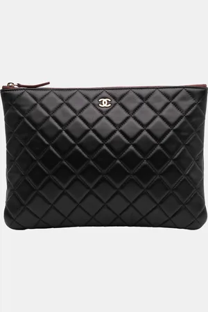 CHANEL Medium Quilted Lambskin O Case Clutch