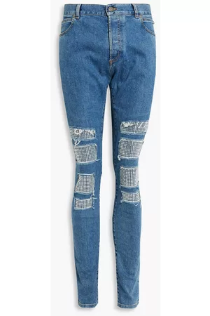 Balmain Men Slim - Slim-fit distressed studded denim jeans - Blue