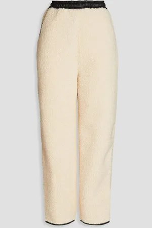 Deadwood Leather-trimmed faux shearling track pants - White