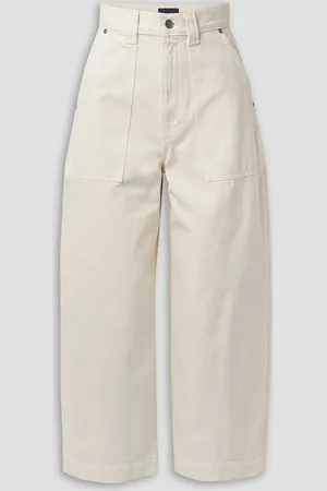 Khaite Hewey cropped high-rise tapered jeans - White