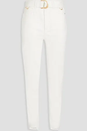 AJE Bianca embellished high-rise slim-leg jeans - White