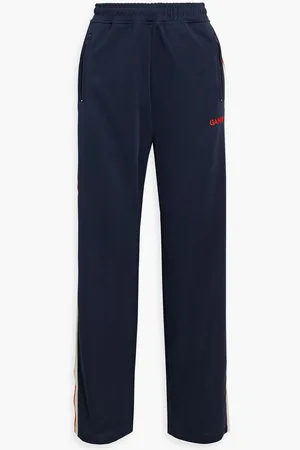 Ganni Embroidered jersey track pants - Blue