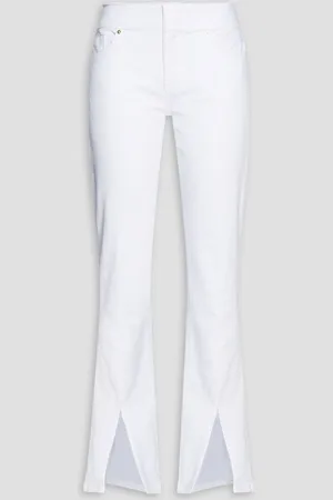 Frame Mini Boot frayed high-rise bootcut jeans