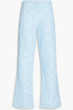 Ganni Bead-embellished cutout cloqué flared pants - Blue