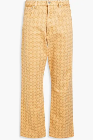 Nanushka Gannon logo-print denim jeans - Neutral