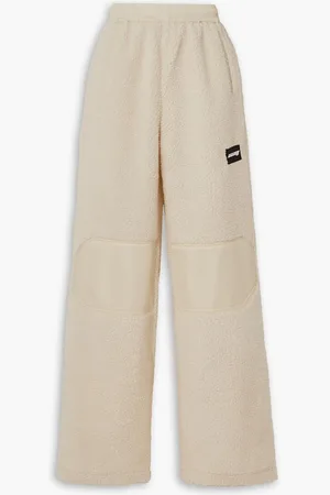 ROTATE Sunday appliquéd shell-trimmed faux shearling sweatpants - Neutral