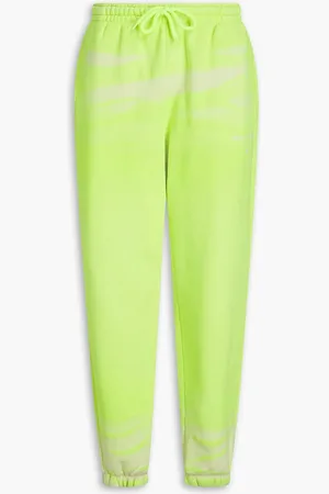 Alexander Wang Neon tie-dyed French cotton-terry track pants - Yellow