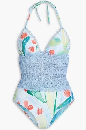 CHARO RUIZ IBIZA Gwen crocheted lace-paneled printed halterneck swimsuit - Blue
